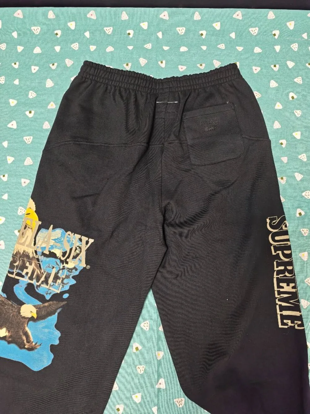 Supreme Black Sweatpants with Eagle Graphic and Tan & Blue Accents